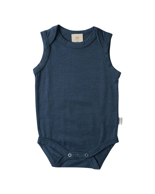 Blue sleeveless 100% merino wool baby bodysuit on a light gray background