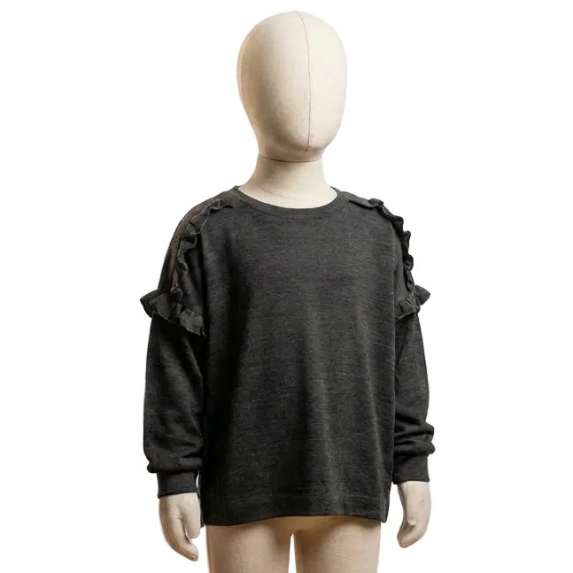 100% merino wool girls charcoal grey long sleeve top with frills across shoulders and around top of arms on a mannequin