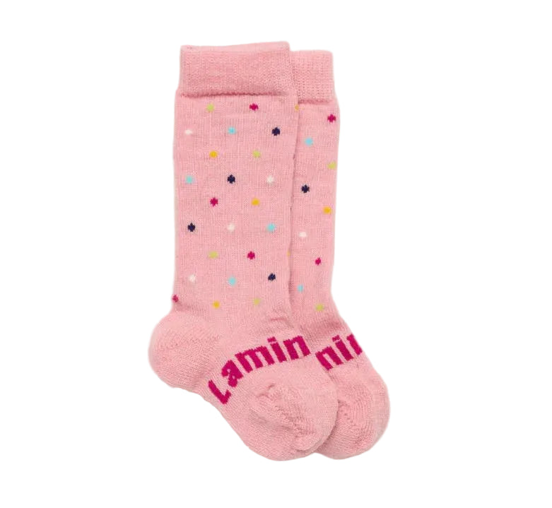 A pair of merino wool pink knee-high baby socks with multicolored polka dots and the brand name 'Laminil' printed in pink on the toes, displayed against a plain white background.