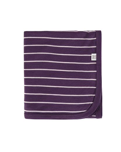 Purple and white striped 100% merino wool lightweight blanket with a small Babu brand logo on a light gray background
